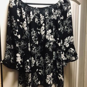 Torrid black blouse with white flowers.